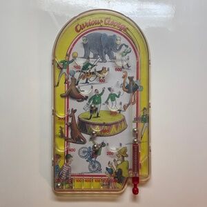 Schylling Curious George handheld pinball game